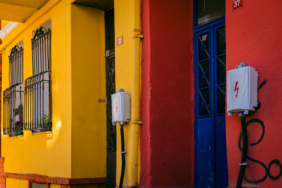 A vibrant scene of colorful buildings in Istanbul, showcasing yellow and red facades.